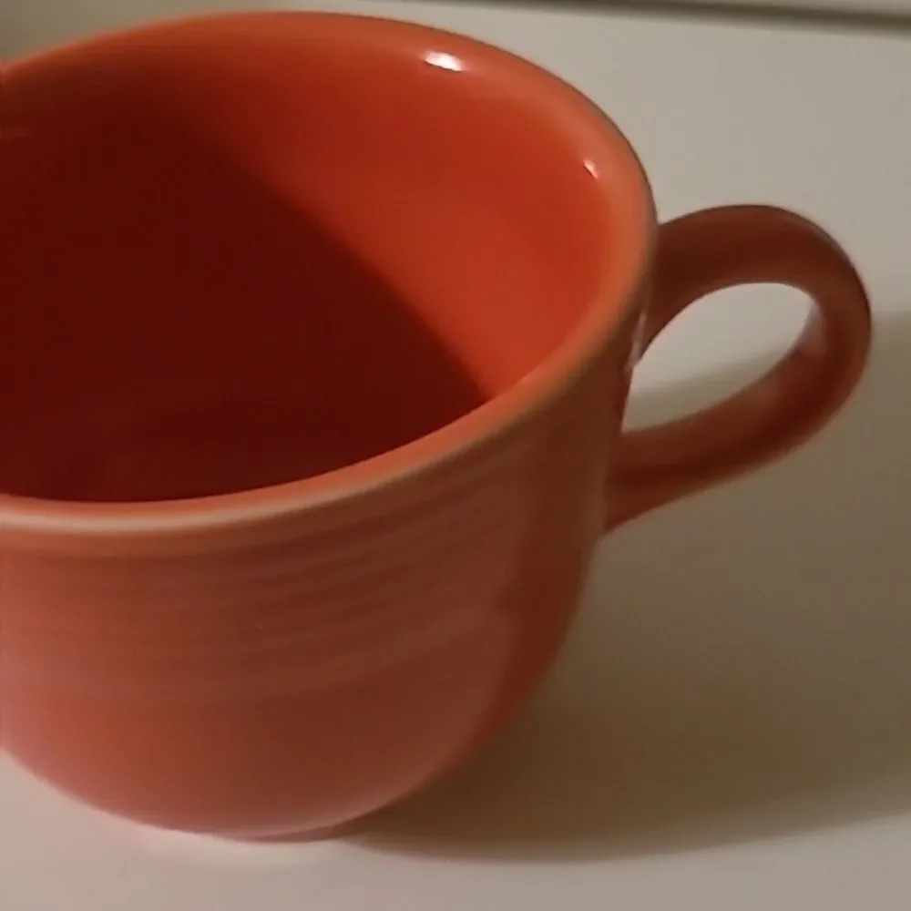 Fiestaware Orange Cup and Saucer Set